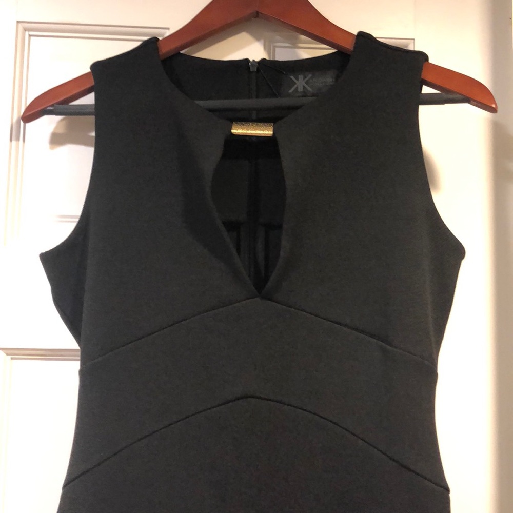 black bodycon dress with gold detail